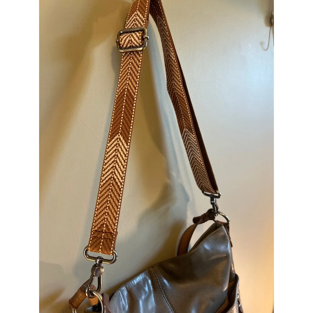 The Sak Slate Gray Leather Hobo Crossbody Bag with Chevron Guitar Strap